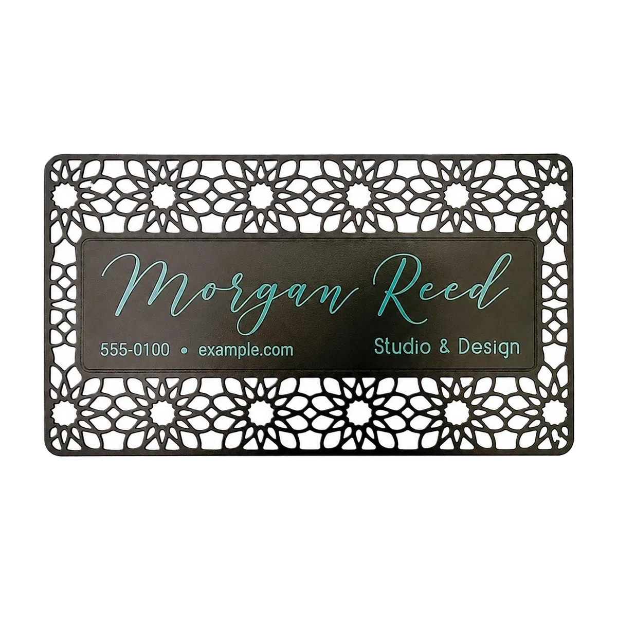 Metal card with intricate laser-cut decorative pattern