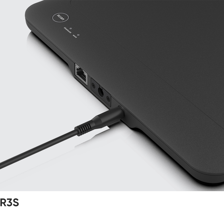 USB Type-C cable being connected to the R3S, with the RJ45 and DC ports visible alongside