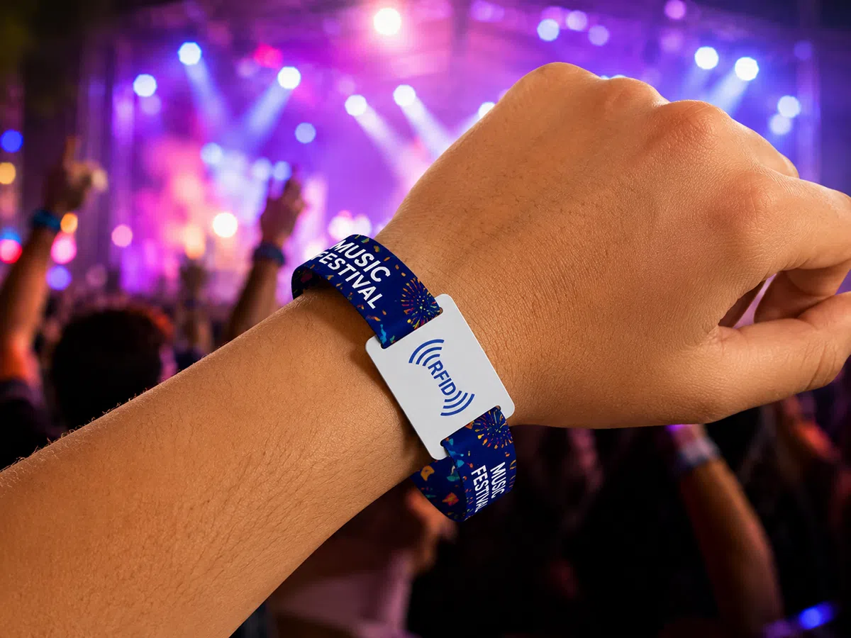 RFID fabric wristband worn at a music festival for admission and VIP access